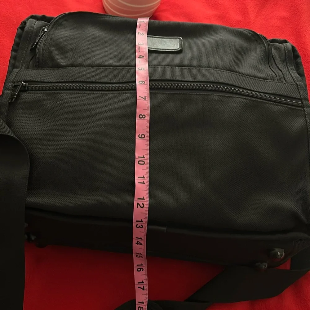Tumi Black brief case/messenger bag